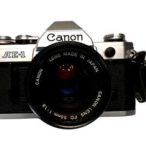 Canon AE-1 SLR Film Camera + Canon FD 50 mm 1:18 Lens + Speedlite 188A Flash